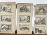 four old pictures of a train on display on a shelf