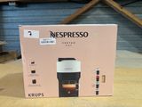 a box that has a coffee maker inside of it