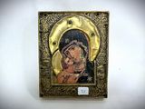 an icon of the virgin mary and child jesus in a gold frame