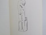 an open book with a drawing of a woman holding a suitcase