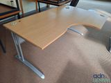 an image of a desk with a chair in the corner