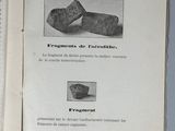 an open book with a picture of a pair of shoes on top of it