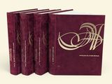 un lot de quatre livres ornés de lettres dorées