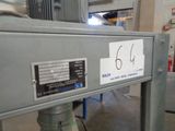 a picture of a machine in a factory with a number on it