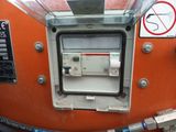 a close up of a machine with a no smoking sign on it