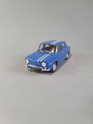 a small toy car that is sitting on a table