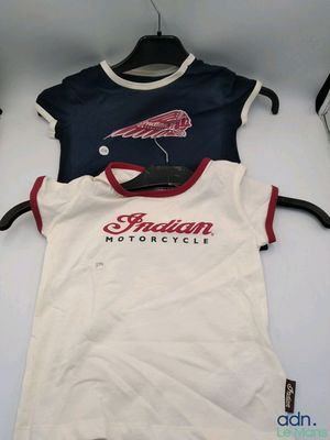 a white shirt with a red and blue design on it