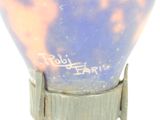 a close up of a light bulb with a blue sky in the background