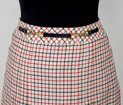 a close up of a skirt with a belt on a mannequin mannequin mannequin mannequin mannequin mannequin mann
