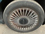a close up of a tire on a car ' s rim