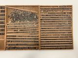 an old type of typewriter with many different types of letters