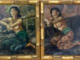deux tableaux représentant une femme et un homme assis sur un canapé
