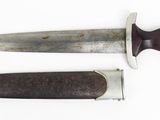 two knives are shown side by side on a white surface
