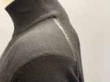 an image of a mannequin wearing a black sweater