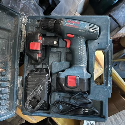 a box with tools in it sitting on a table