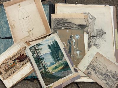 a pile of old books sitting on the ground