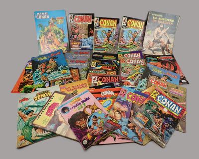 a lot of comic books that are on the table