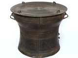 an image of a wooden table with metal handles and a wooden top