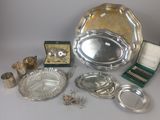 several silver plate and silverware items including a bowl, tray, spoon, and other items