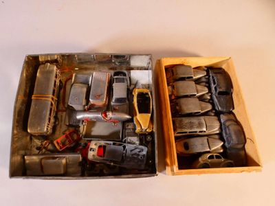 a box with a bunch of toy cars inside of it