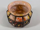 a small vase that is sitting on a table