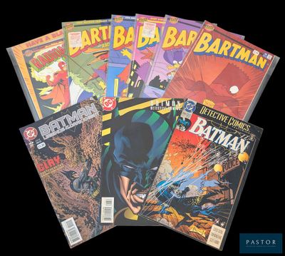 Les bandes dessinées Batman sont alignées sur un fond noir