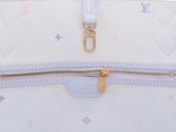 a white purse with a gold zipper on it