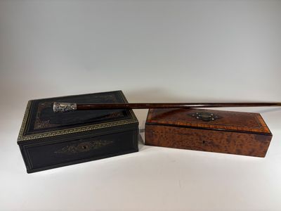 two wooden boxes with a wooden handle and a wooden box with a wooden handle
