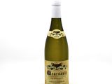 a bottle of wine that is sitting on a table