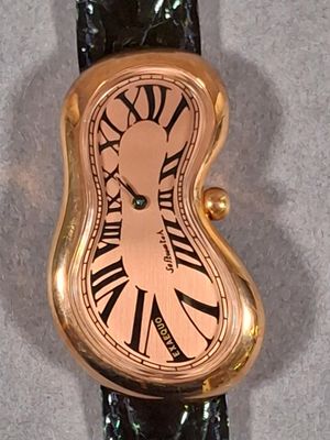 SOFTWATCH EX AEQUO. Montre en métal doré