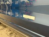 a close up of a car door with a sticker on it