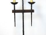 a lamp that is on a stand with a lamp shade on it