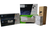 three toner cartridges and a box of toner paper on a white background