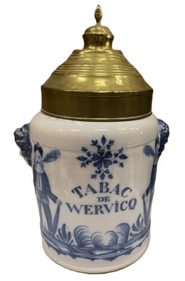 an image of a blue and white jar with a gold lid