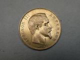 an image of a gold coin with a man ' s face on it