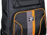 the back pack is black and orange with a small logo on it