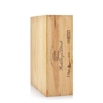 the wooden box is holding a bottle of wine on a white background