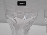 two empty wine glasses sitting on a table