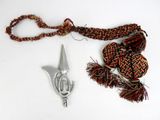 a pair of scissors and a scarf on a white surface