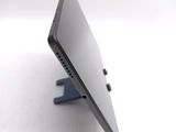a close up of a tablet computer on a stand