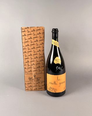 une image représentant une bouteille de vin à côté d'une boîte à bouchons