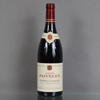 a bottle of wine that is sitting on a table