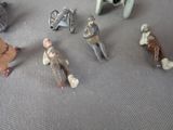 many figurines of soldiers sitting on a table