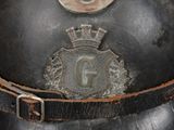 a close up of a helmet with a crown on it