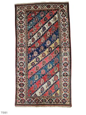 a rug with a multicolored design on a white background