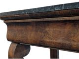 a close up of a wooden table with a marble top
