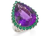 une bague sertie d'un améthorate et d'une émeraude