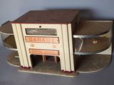a small toy oven sitting on top of a table