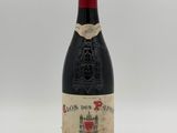 an image of a bottle of wine sitting on top of a table