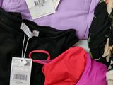 a lot of clothes that are on a table